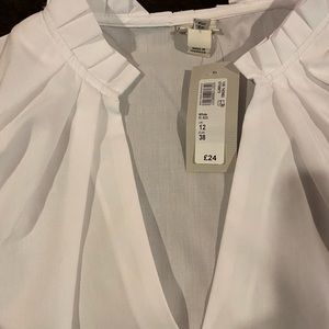 Brand new white short sleeve blouse size US 8